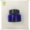 As embalagens 1oz 30ml Cosmetic compõem a fundação de creme vazia líquida azul do frasco de vidro